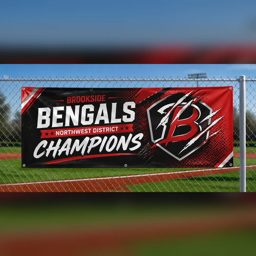 HD vinyl sports banner with grommets zip-tied to a ballfield fence